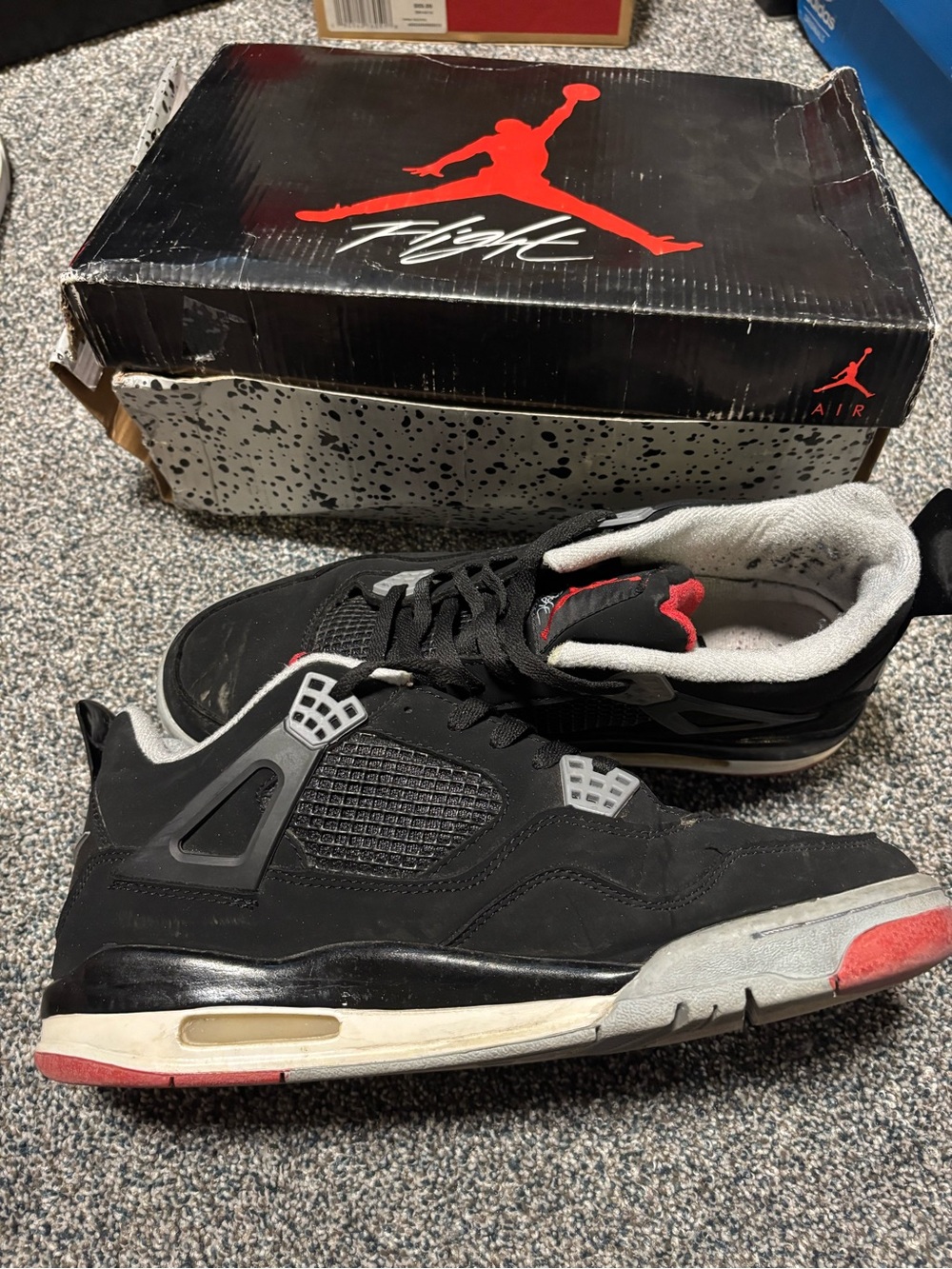 Nike Air Jordan 4 “Bred”
 Black/Red Men's Sneakers